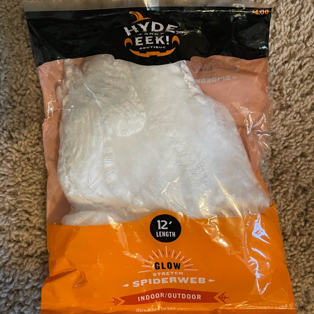 NWT faux glow stretch 12 foot indoor/outdoor spider webbing